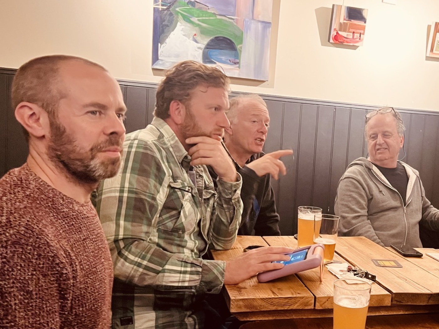 A full table at a Men Talk Music monthly meetup